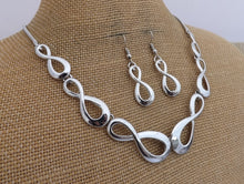 Load image into Gallery viewer, Silver Tone Infinity Twist Collar Necklace &amp; Earrings Set
