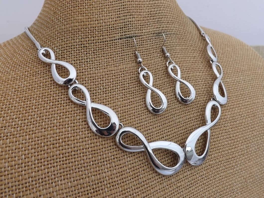 Silver Tone Infinity Twist Collar Necklace & Earrings Set