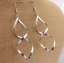 Load image into Gallery viewer, Silver Tone Long Twist Drop Earrings
