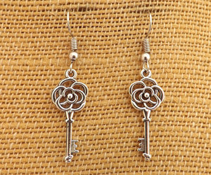 Silver Tone Rose adorned Vintage Key Earrings