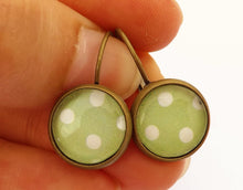 Load image into Gallery viewer, White Polka Dots on Light Green - Bronze Tone Dome Earrings on Lever Back Hooks
