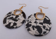 Load image into Gallery viewer, White, Black &amp; Gold Tone Round Acrylic Earrings
